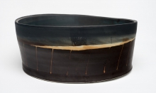 Liten oval brun